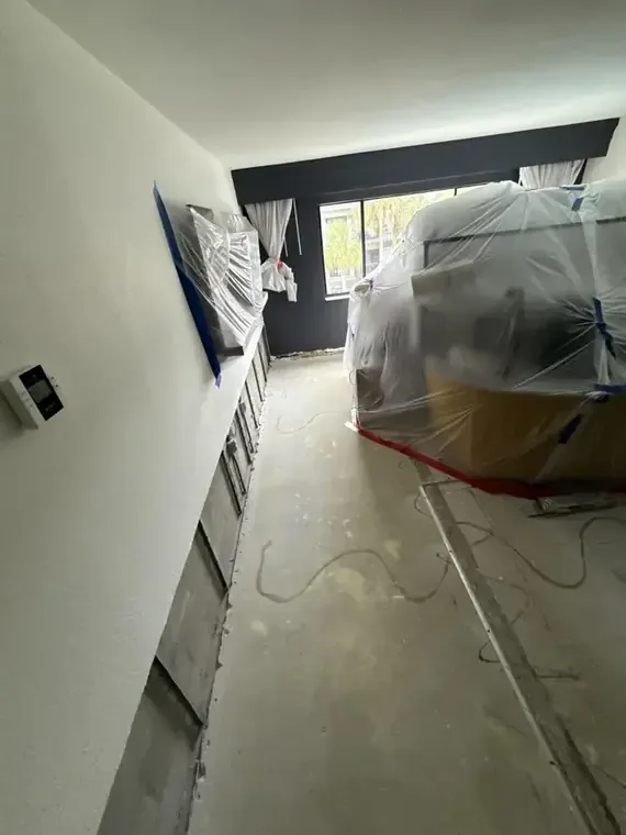 Plastic containment and equipment cables in an interior passage